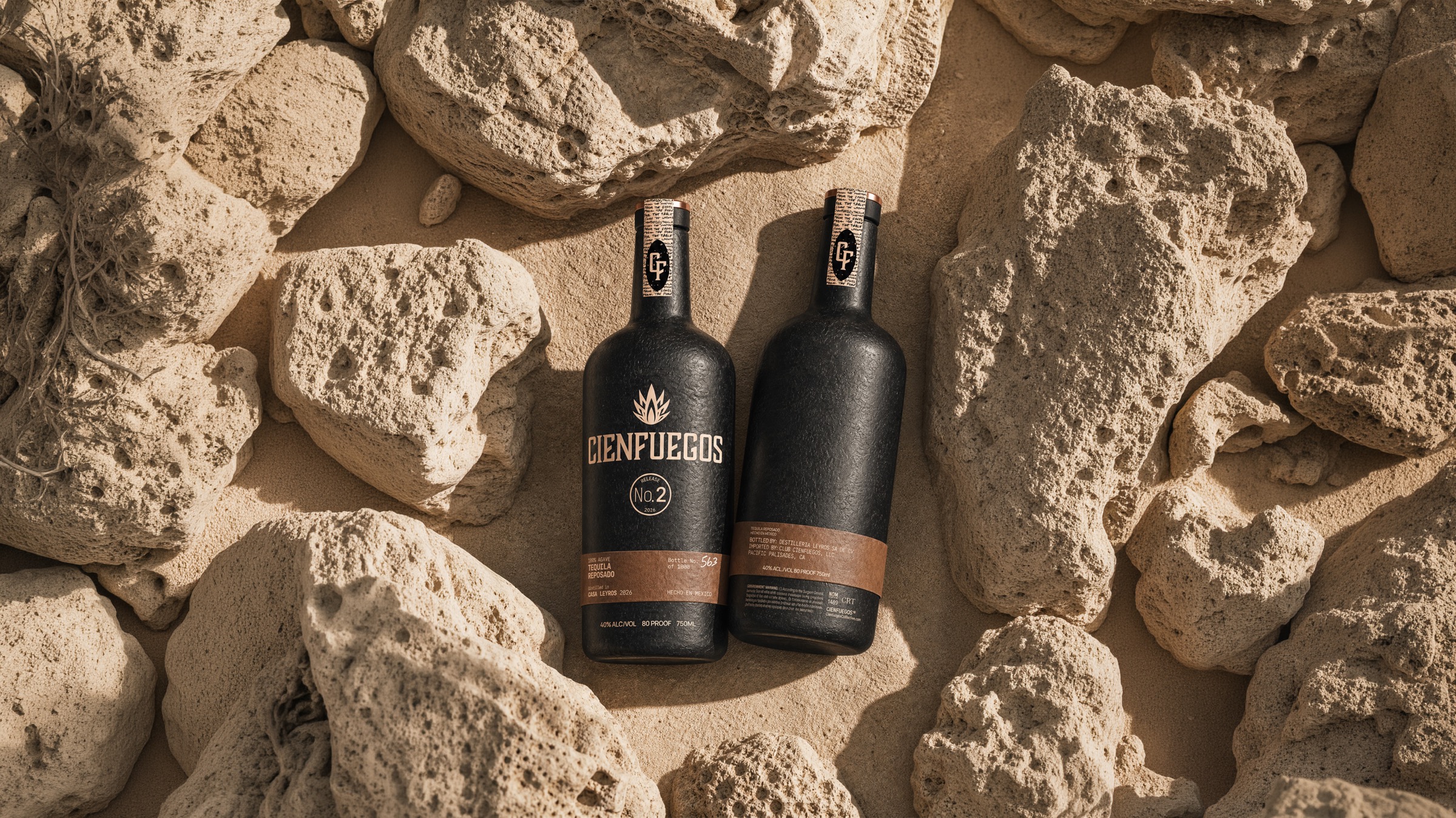 Cienfuegos Release No. 2 bottles on volcanic rock